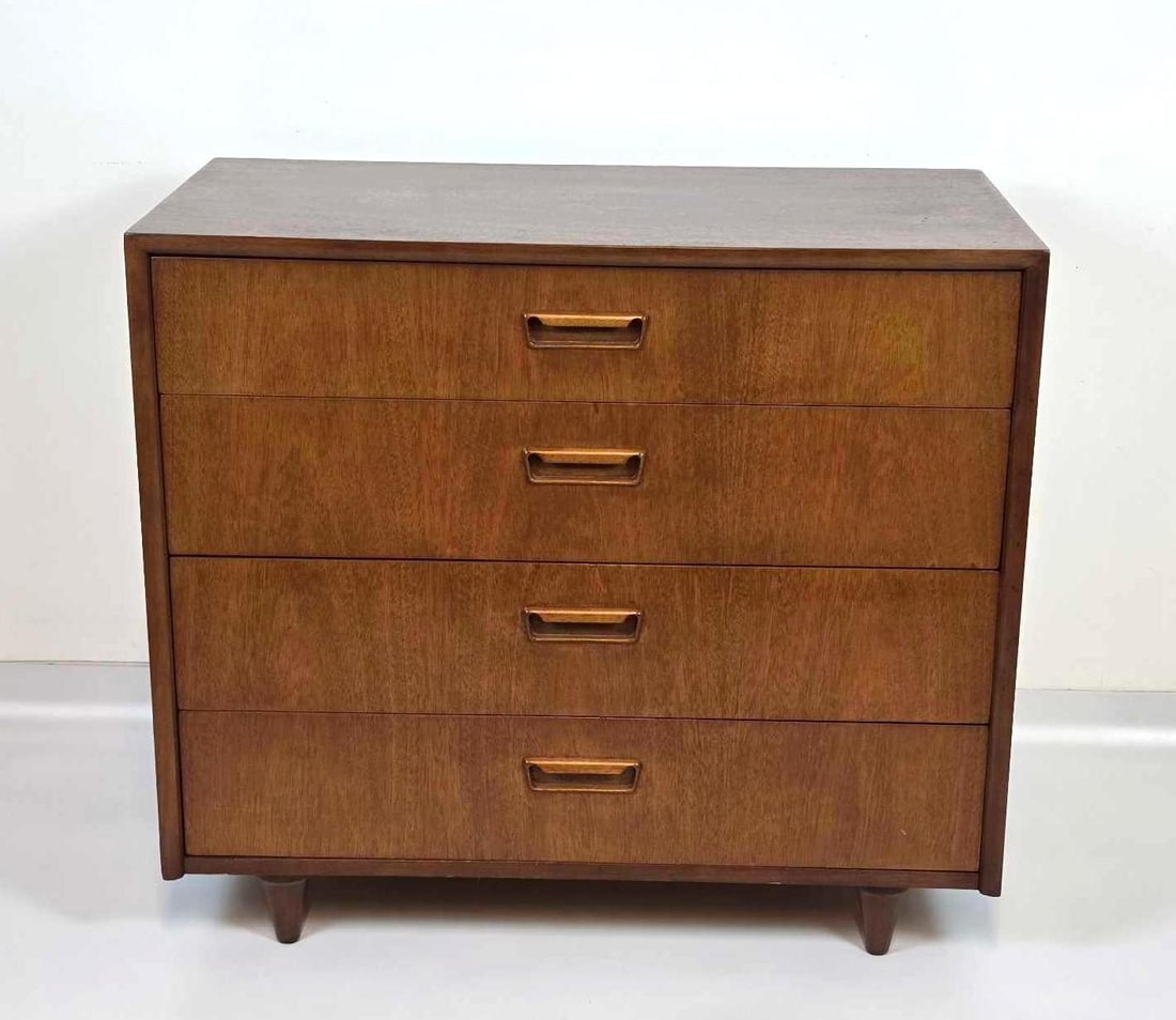 AMERICAN OF MARTINSVILLE MID CENTURY FOUR DRAWER CHEST: A mid century modern, rectangular four-drawer dresser with tapered legs and inset wood pulls. Approximate Dimensions: 30.25"H x 34"W x 18.5"D Artist or Maker: American of Martinsville Prov