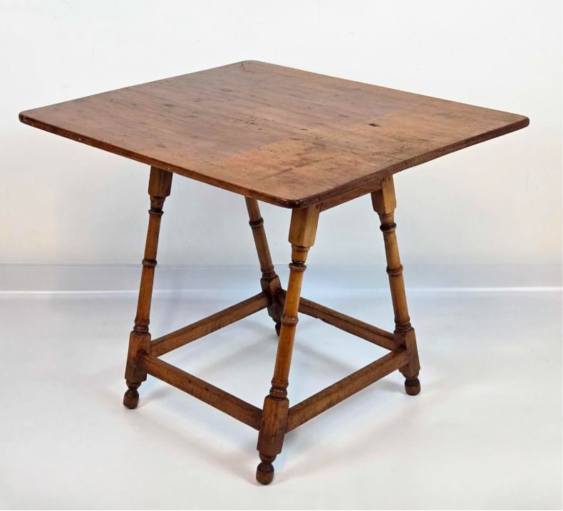 19TH CENTURY ANTIQUE AMERICAN PRIMITIVE PINE STRETCHER BASE TAVERN TABLE: Country style rectangular pine utility or tavern table with an overhanging plank top resting on vase-and-ring turned splayed legs joined by a robust four-sided box stretcher. Approximate Dimensions: 2