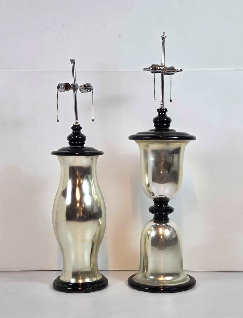 TWO VINTAGE BLACK LACQUERED WOOD AND METALLIC GLASS TABLE LAMPS: Pair of mid-century, mismatched silver glass table lamps including an hourglass-form lamp and an urn-form lamp mounted on ebonized round wooden bases. Approximate Dimensions: 40"H x 10.5"Dia /