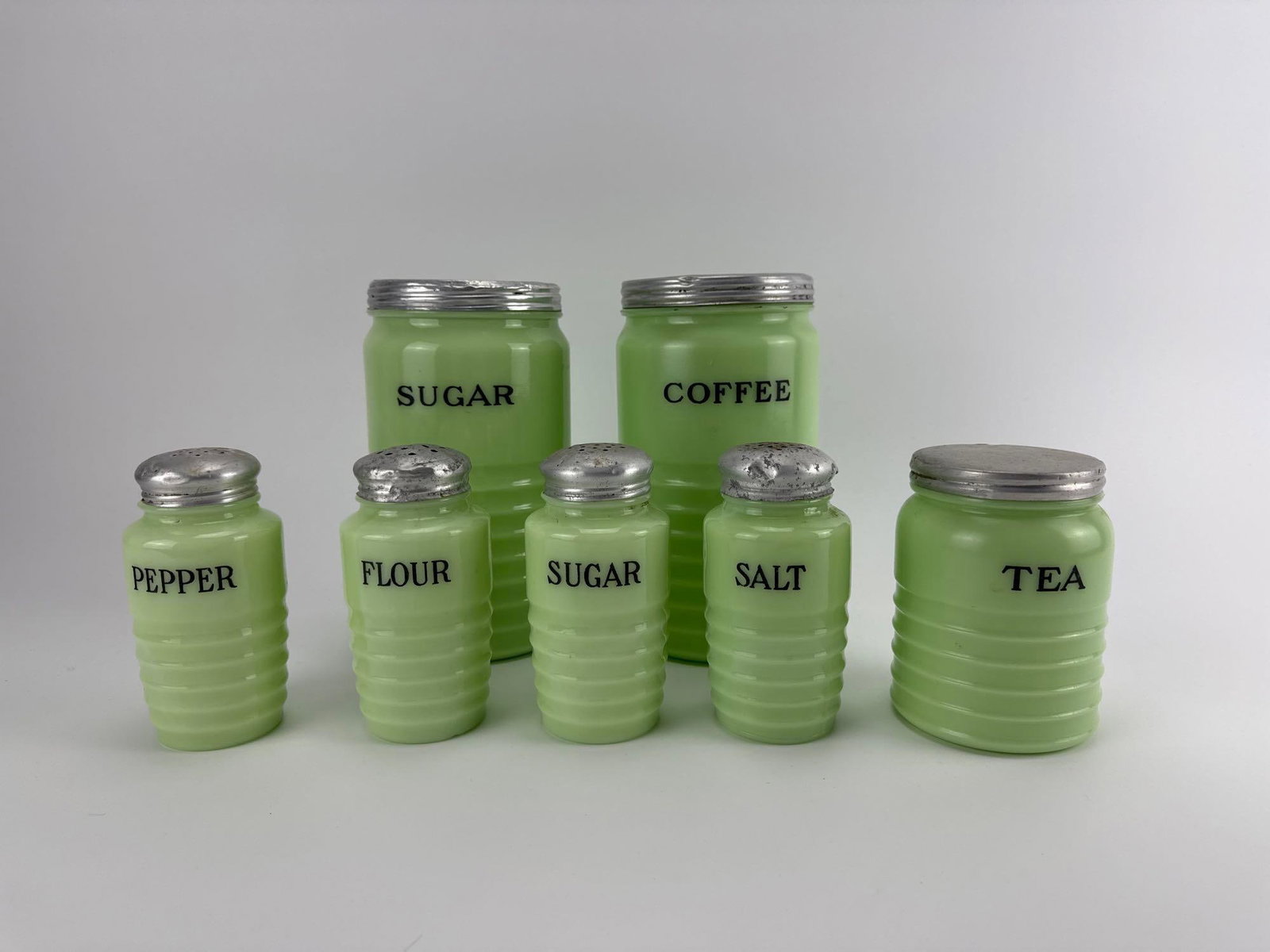 SEVEN VINTAGE JEANNETTE GLASS CO. JADEITE BEEHIVE KITCHEN CANISTER AND SHAKER SET (1 of 8)