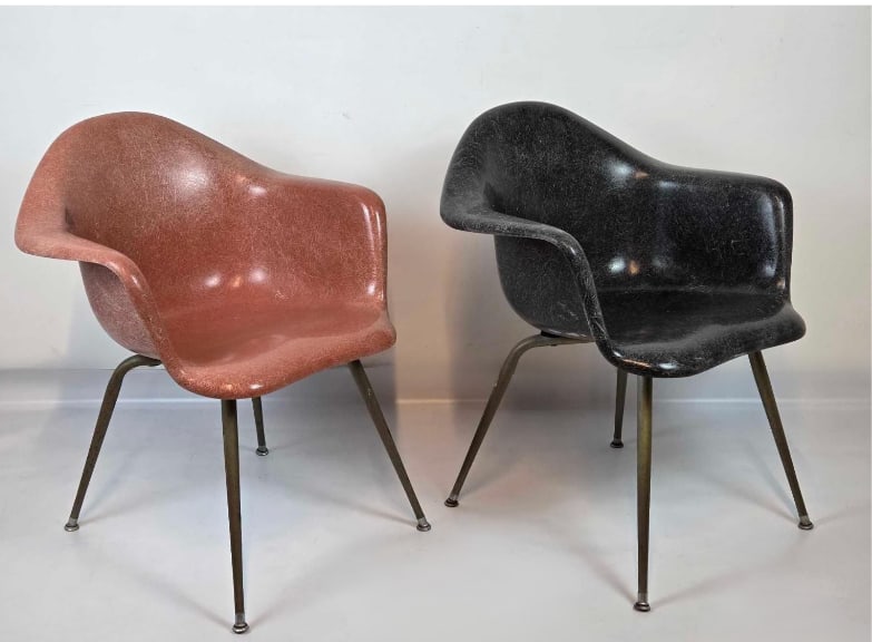 MID-CENTURY VINTAGE EAMES-ERA FIBERGLASS SHELL ARM CHAIRS BY CHROMCRAFT, PAIR: Pair of molded fiberglass shell armchairs by Chromcraft, in coral/salmon and black, on brass tapered legs, circa 1950s–60s. Approximate Dimensions: 30.5" H X 25.5" W X 23" D Artist or Ma