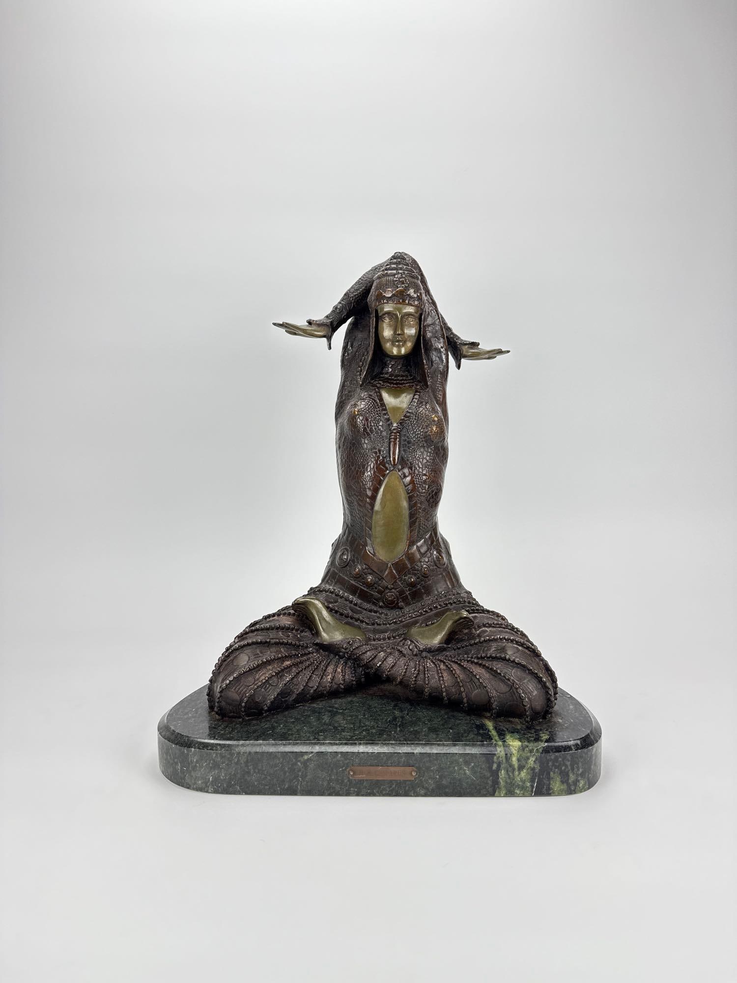 ANTIQUE STYLE BRONZE SEATED WOMAN SCULPTURE INSCRIBED D.H. CHIPARUS: Patinated cast bronze figure after Demetre Chiparus depicting an exotic dancer or deity in a cross-legged meditative yoga posture mounted on a contoured green marble base with an inscribed signature A