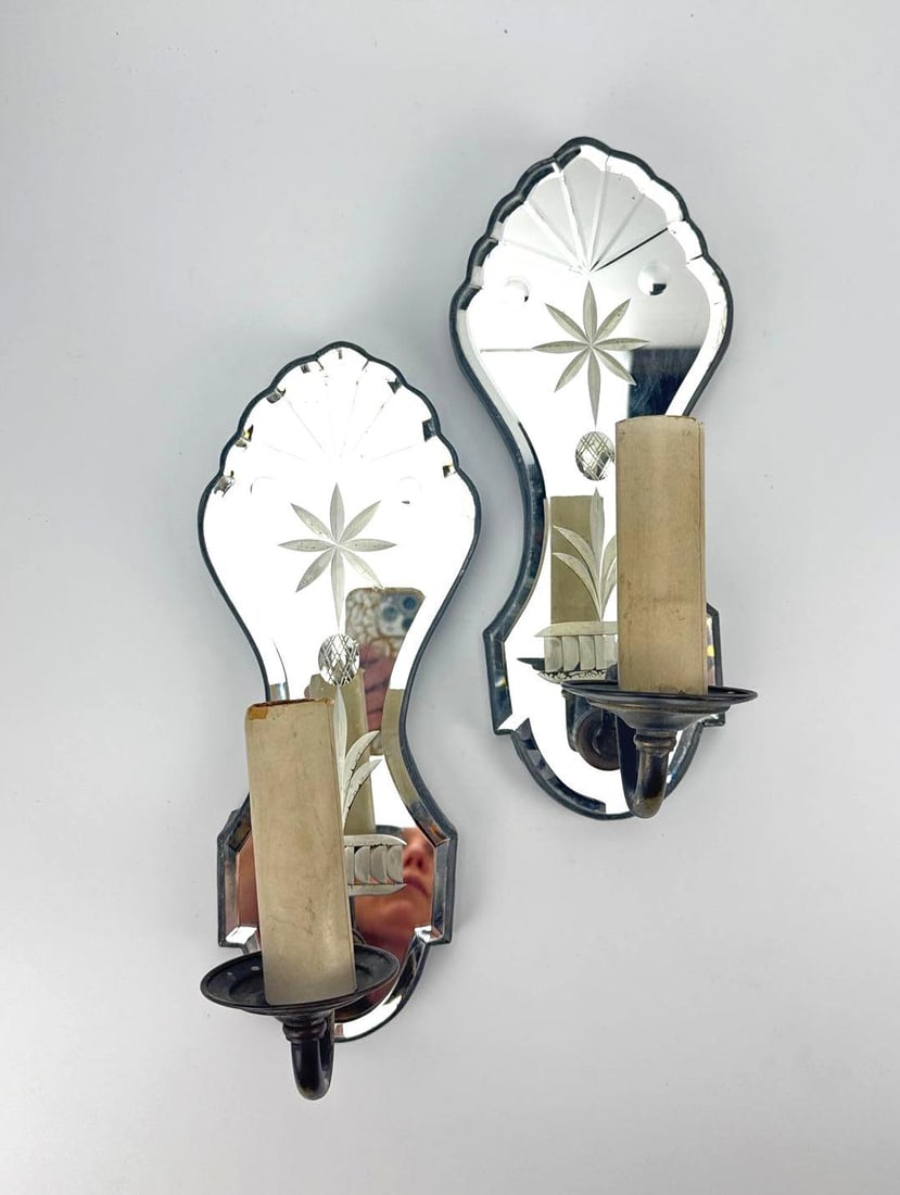 PAIR OF VINTAGE VENETIAN STYLE CUT GLASS MIRROR-BACK SCONCES: Pair of mid-century Venetian style single-light wall sconces, featuring cartouche-shaped mirror backplates with hand-cut wheel-engraved starburst and floral designs, scalloped edges, and single scroll