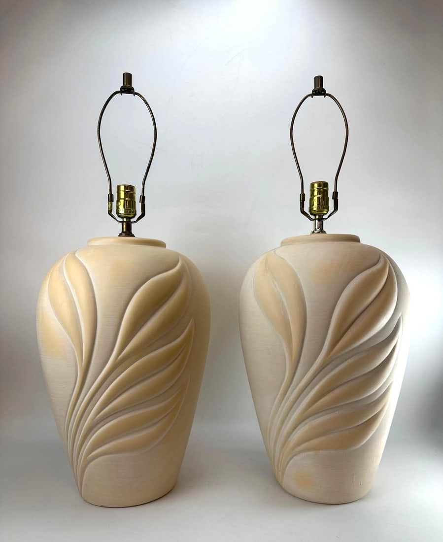 PAIR OF POSTMODERN PALM BEACH MATTE CERAMIC LEAF MOTIF TABLE LAMPS: *A pair of large, matte, pastel coral colored ceramic table lamps with a prominent raised sculpted flowing leaf design. Approximate Dimensions: 29”H x 12”Dia Artist or Maker: Unknown