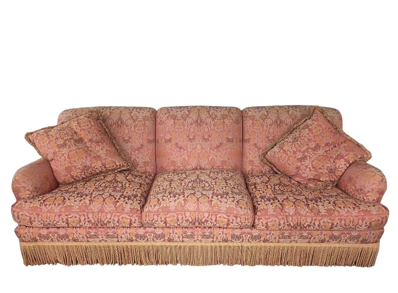 EXCEPTIONALLY UPHOLSTERED DOWN CUSHION SOFA WITH BULLION FRINGE: Custom traditional three-cushion sofa upholstered in a rust and gold bird-and-floral damask fabric, with down-filled cushions, rolled arms, and a deep bullion fringe skirt; includes two coordinating f