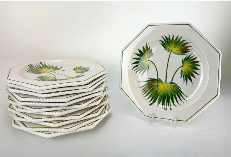 SET OF TWELVE ITALIAN MAJOLICA LOTUS AND PALM HAND-PAINTED POTTERY CHARGER PLATES: Set of twelve vintage octagonal Italian ceramic majolica dinner plates painted with a vibrant green palm tree frond pattern on a cream ground with matching rim borders. Approximate Dimensions: 10.75&r