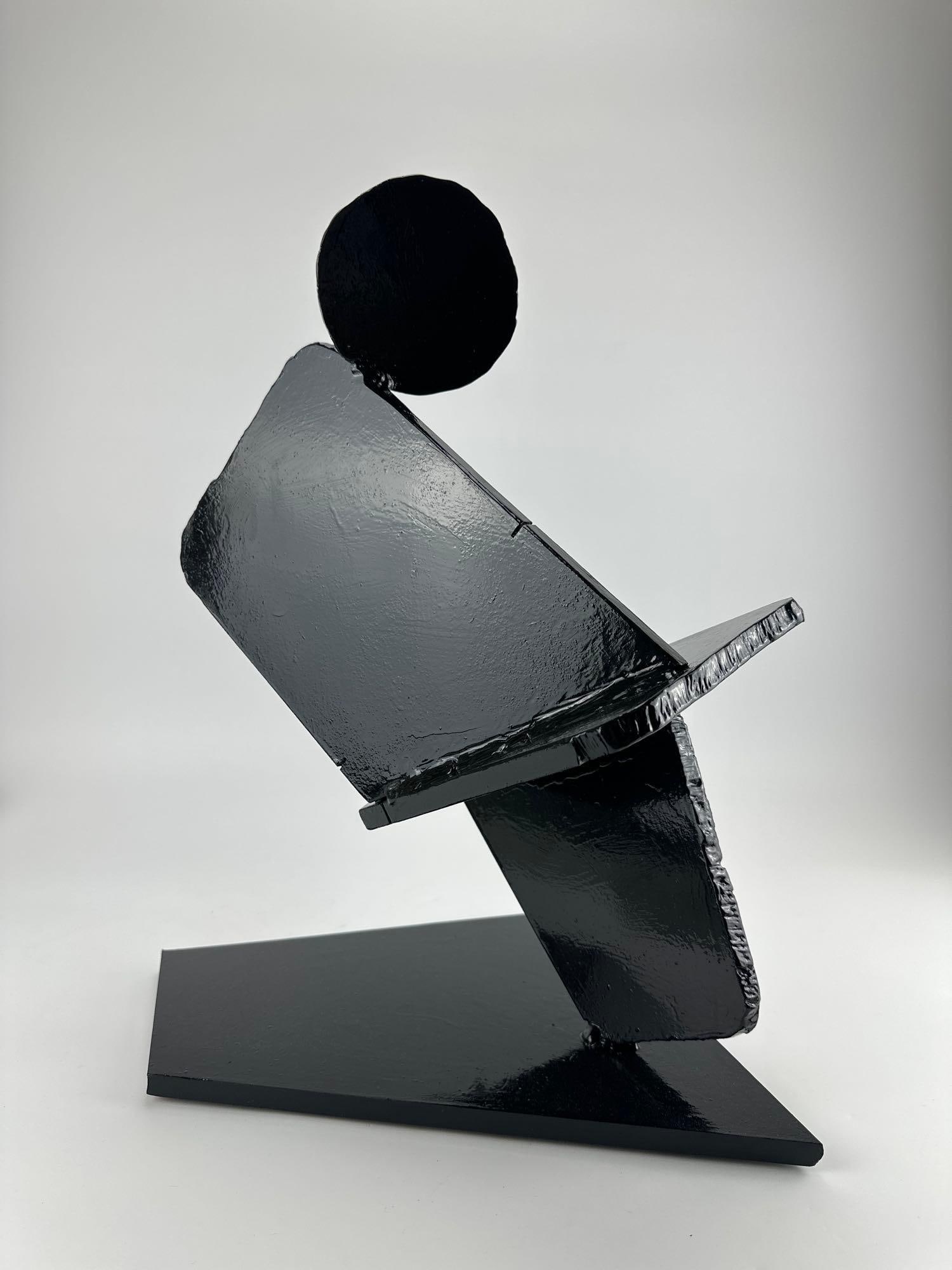 JAMES T. GRECO ABSTRACT CONTRUCTIVIST WELDED STEEL SCULPTURE: Abstract welded steel sculpture of a stylized geometric form in black finish on an integral base,. Approximate Dimensions: 19" H x 17" W x 11" D Artist or Maker: James T. Greco Provenance: