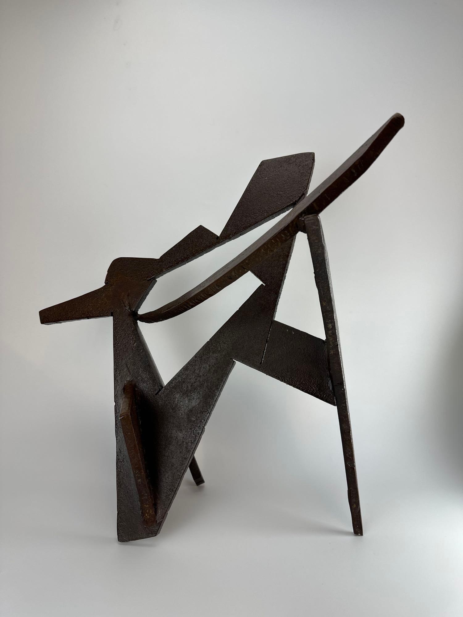 JAMES T. GRECO ABSTRACT CONTRUCTIVIST WELDED STEEL SCULPTURE: Large abstract welded steel sculpture of intersecting angular planes with rich patina. Approximate Dimensions: 21" H x 18" W x 12" D Artist or Maker: James T. Greco Provenance: From the ar