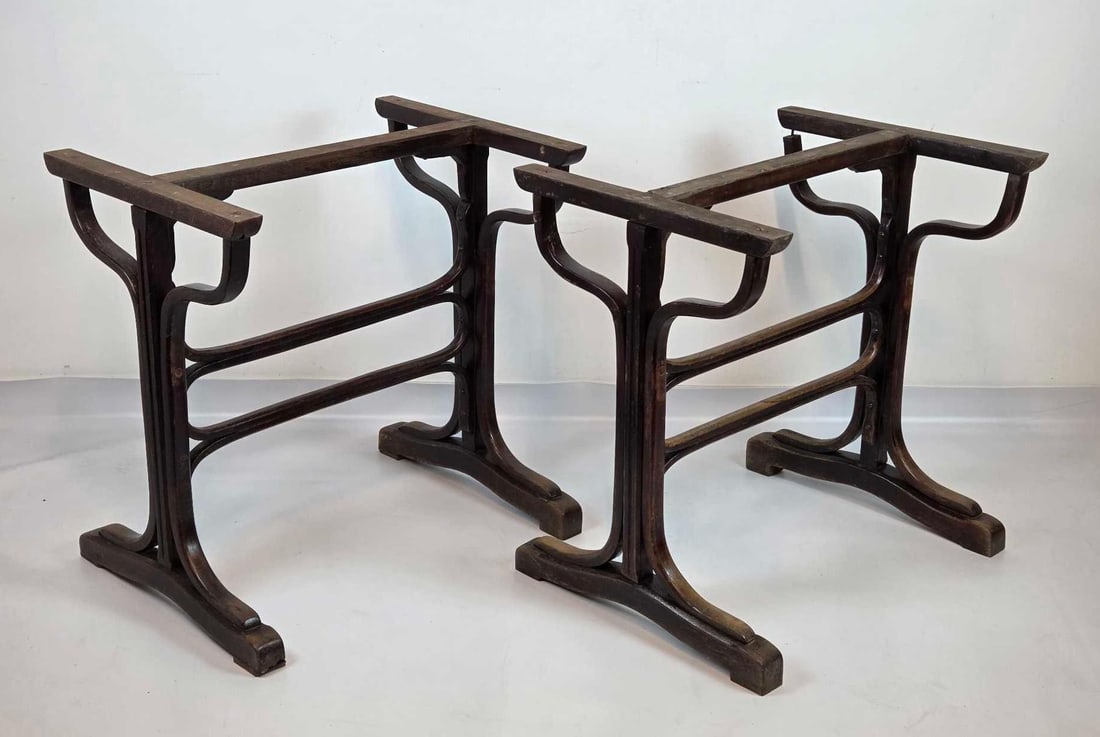 PAIR ANTIQUE THONET STYLE BENTWOOD TRESTLE TABLE BASES: Pair of dark finished bentwood table bases with curved scroll supports, bases only without tops Approximate Dimensions: 28.25" H x 28" W x 21.5" D each Artist or Maker: Unknown