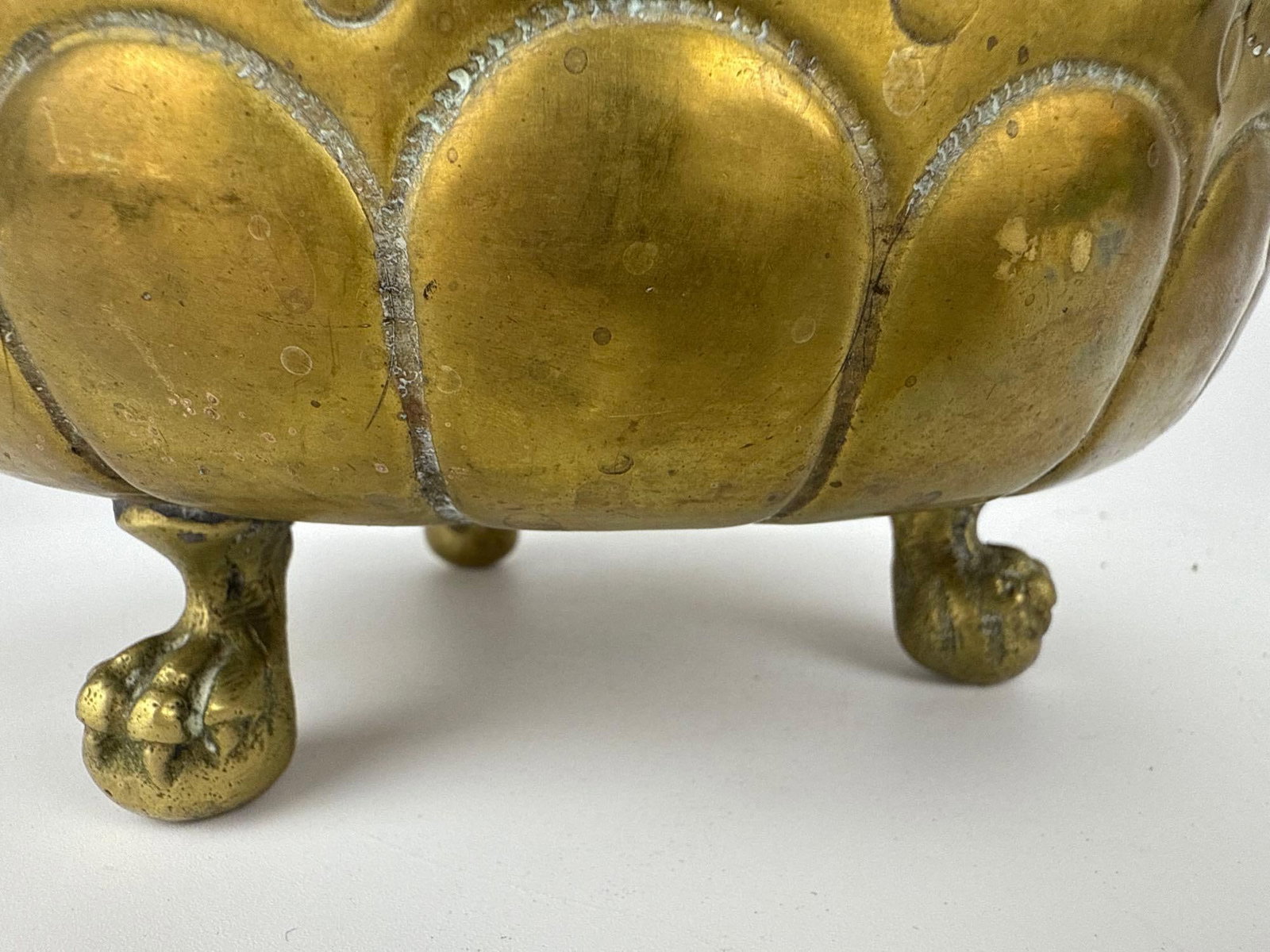 TWO REPOUSSE BRASS FOOTED CACHEPOTS - 10