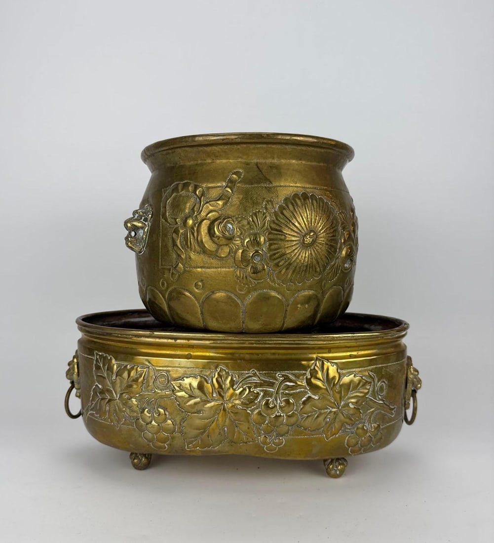 TWO REPOUSSE BRASS FOOTED CACHEPOTS - 11