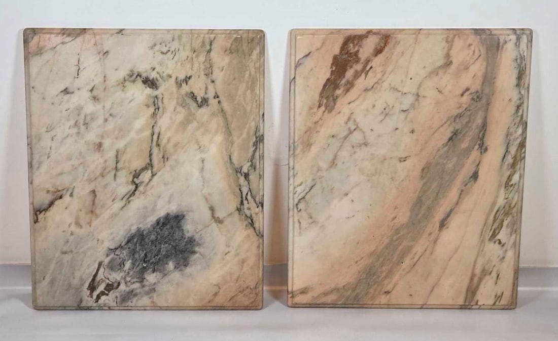 TWO MARBLE TABLE TOPS CREAM AND GRAY VEINED: Two rectangular cream marble table tops with gray and rose veining. NOTE DRILLED HOLES IN PHOTOS Approximate Dimensions: 27.5" x 33.5" each Artist or Maker: Unknown Provenance: From a New York