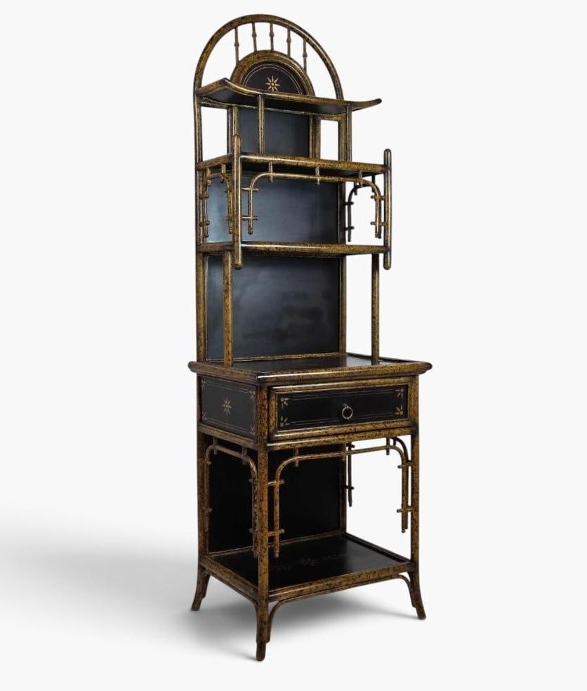 VICTORIAN AESTHETIC MOVEMENT LACQUERED BAMBOO ÉTAGÈRE, PAINT-DECORATED: Tall lacquered bamboo étagère with arched crest, graduated shelves, a small drawer, and gilt paint decoration. Approximate Dimensions: 66.75" H X 22" W X 16" D Artist or Maker: Unknown; 