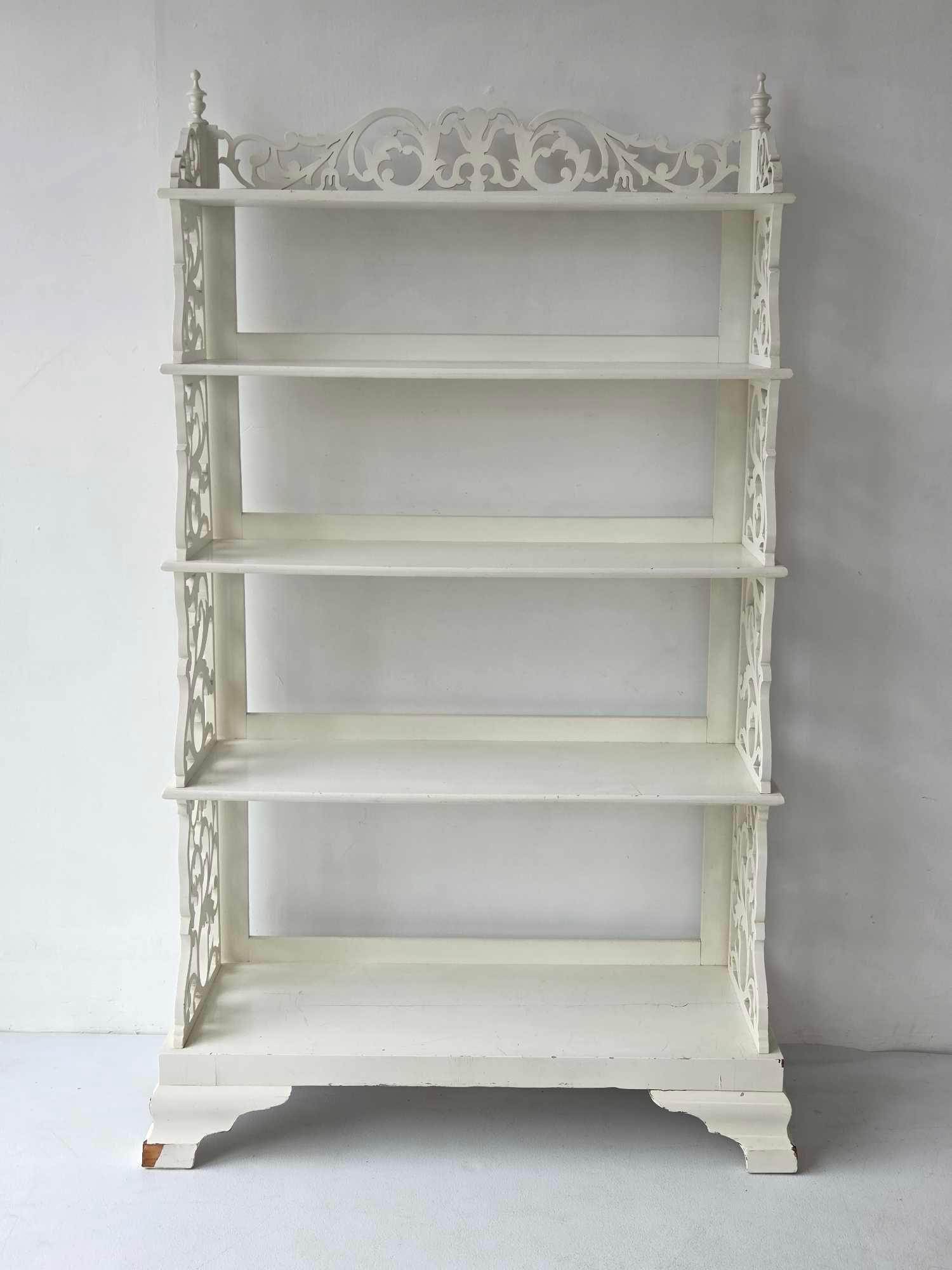 ANTIQUE VICTORIAN WHITE PAINTED FIVE TIER ETAGERE WITH FRETWORK: Antique white painted five tier etagere with elaborate pierced fretwork sides and crest, turned finials and shaped bracket feet Approximate Dimensions: 70" H x 35.75" W x 15.25" D Artist o
