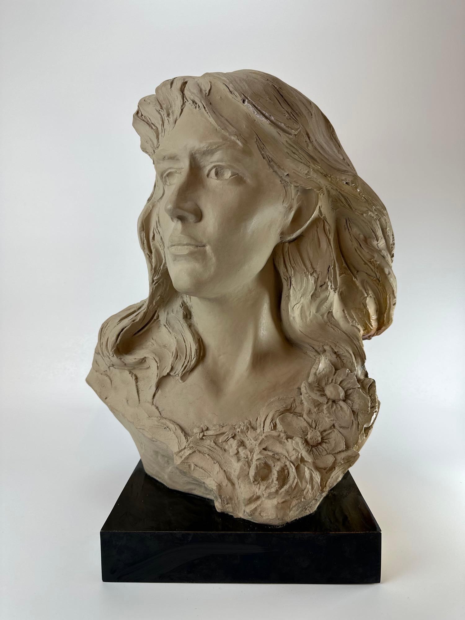AUSTIN PRODUCTIONS SCULPTURAL BUST OF A YOUNG WOMAN WITH FLOWERS: *Large vintage plaster/durastone bust sculpture of a young woman with flowing hair and floral embellishments along the shoulders. Approximate Dimensions: 15”x10”x21” Artist or Maker:
