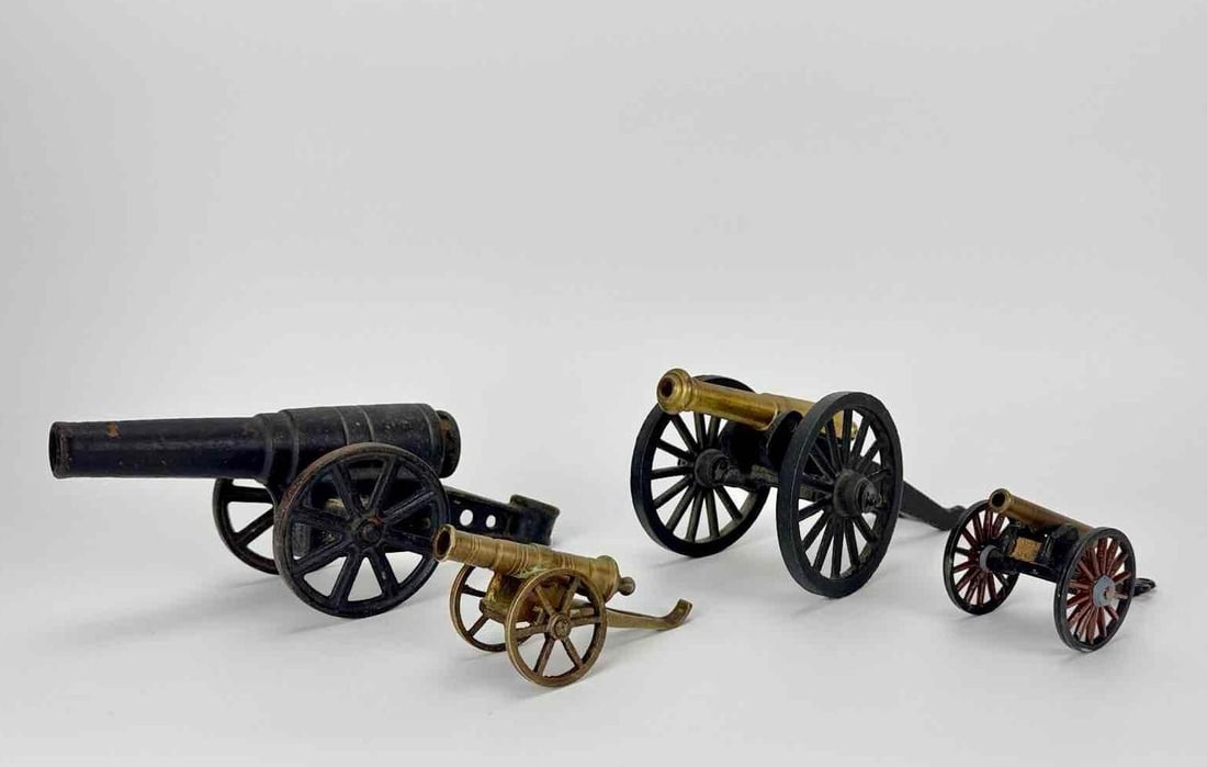 LOT OF 4 VINTAGE CAST IRON & BRASS MINIATURE CANNON MODELS: *Four assorted vintage cast iron and brass miniature field artillery cannons in varied scales. Approximate Dimensions: Largest : 4” H X 5” W X 8” D Artist or Maker: Unknown Provena