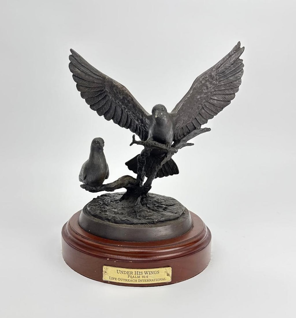 SCOTT STEARMAN BRONZE SCULPTURE UNDER HIS WINGS: *Bronze sculpture by artist Scott Stearman titled "Under His Wings" depicting two doves perched on branches, mounted on a turned wooden base with a brass plaque inscribed Psalm 91:4 and Life O