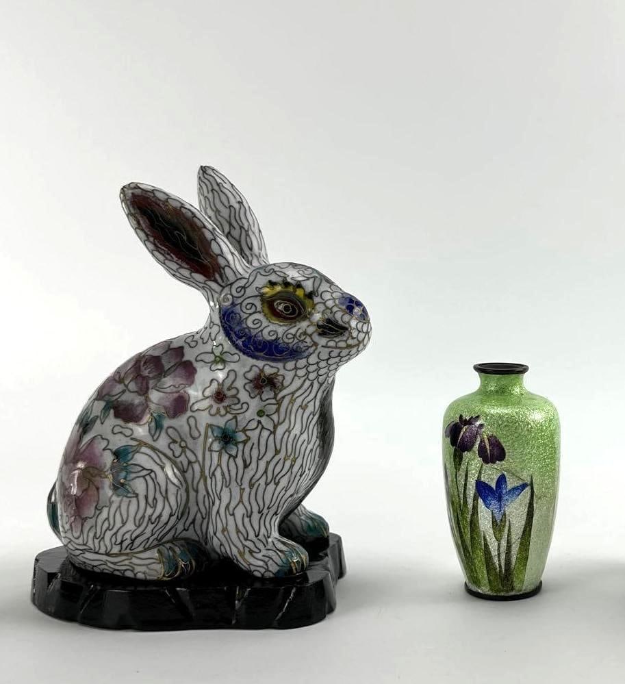 CHINESE CLOISONNE ENAMEL RABBIT AND MINIATURE VASE: *Chinese cloisonné enamel decorative items including a seated floral rabbit on a carved wooden base and a miniature green floral vase Approximate Dimensions: Rabbit: 5”x3”x6” Hippo: