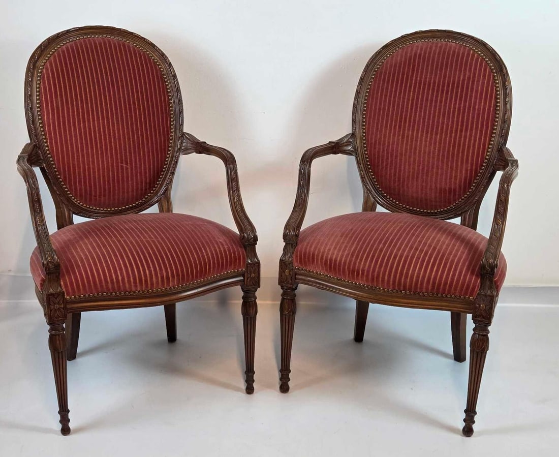 PAIR OF LOUIS XVI STYLE CARVED WALNUT UPHOLSTERED FAUTEUILS (1 of 16)