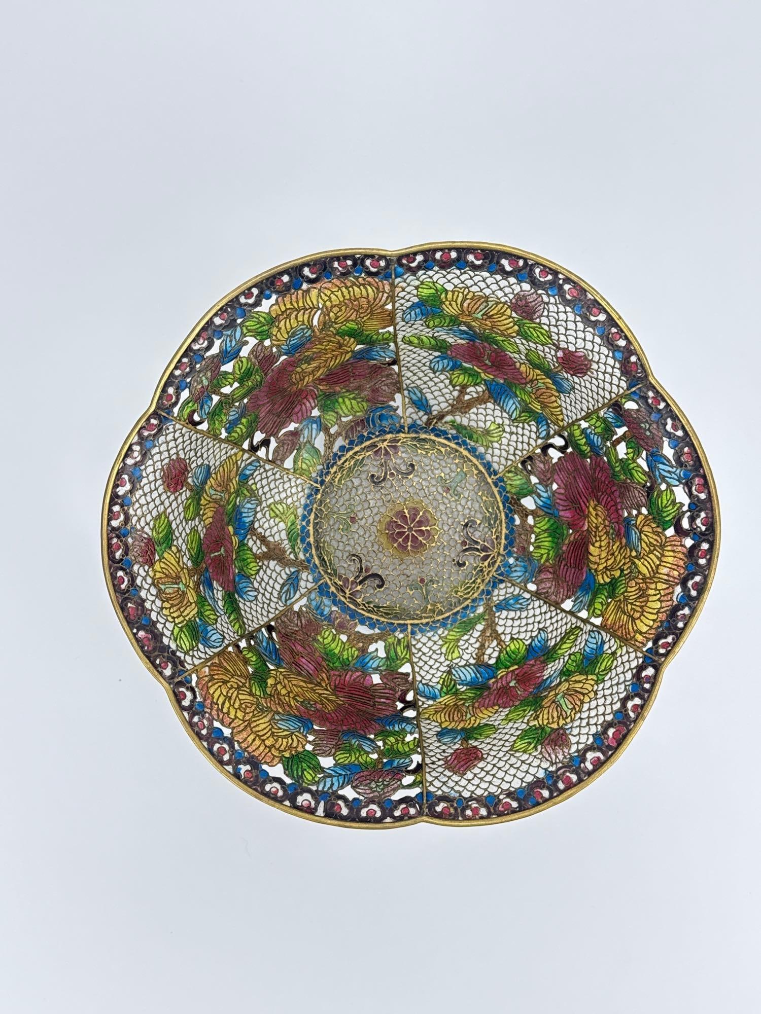 CHINESE PLIQUE À JOUR CLOISONNÉ TRANSLUCENT ENAMEL BOWL: *Chinese plique-à-jour cloisonné bowl, featuring translucent polychrome enamel florals over a fish-scale wire ground, gilt-edged scalloped rim, 20th century. Approximate Dimensions: 3.75"H x 8&#