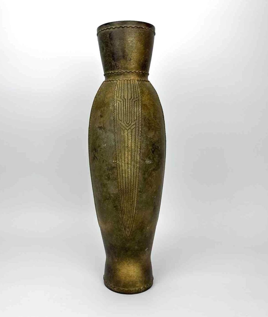 ART DECO EMBOSSED BRASS TALL URN FORM VASE: *Vintage tall brass amphora-form floor vase with hand-hammered finish and stylized Art Deco geometric chevron reliefs. Approximate Dimensions: 17.5” H X 5.5” Dia. Artist or Maker: Unknown 