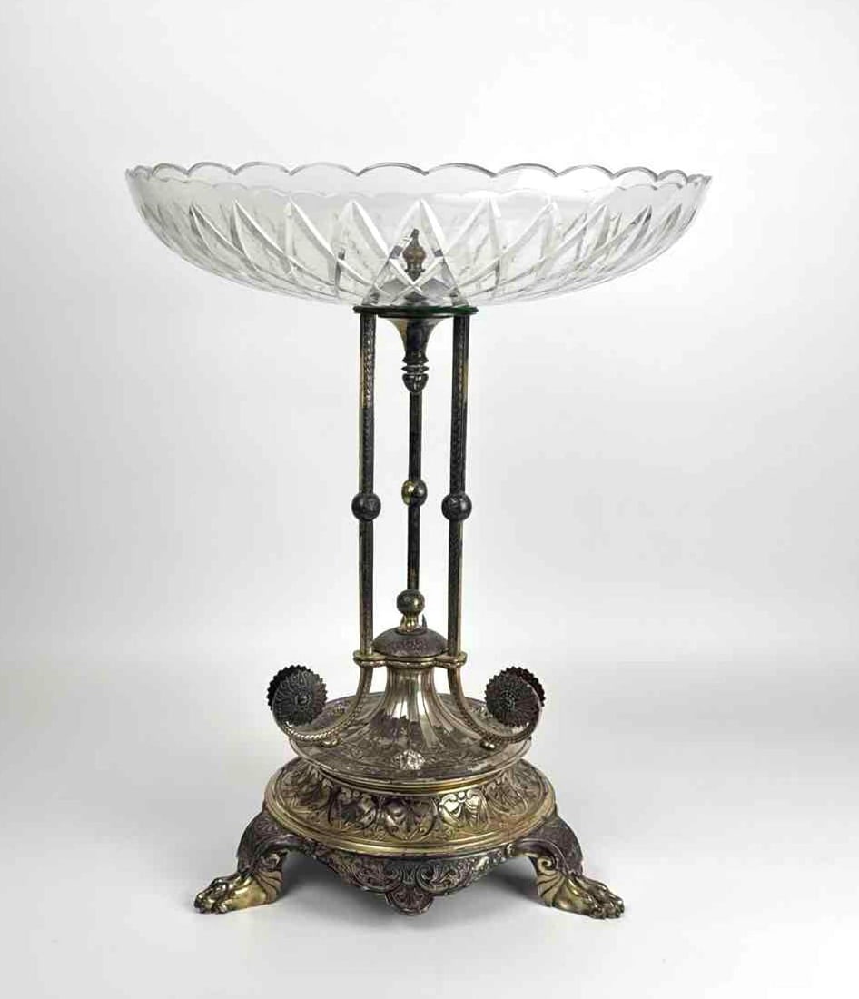 EDWARDIAN STYLE ELKINGTON & CO. SILVER PLATE AND CUT GLASS CENTERPIECE: *Impressive Edwardian style silver-plated table centerpiece, produced by Elkington & Co., featuring a large cut glass bowl set atop a columnar tripod stand with lion paw feet. Note: Cracks in glas