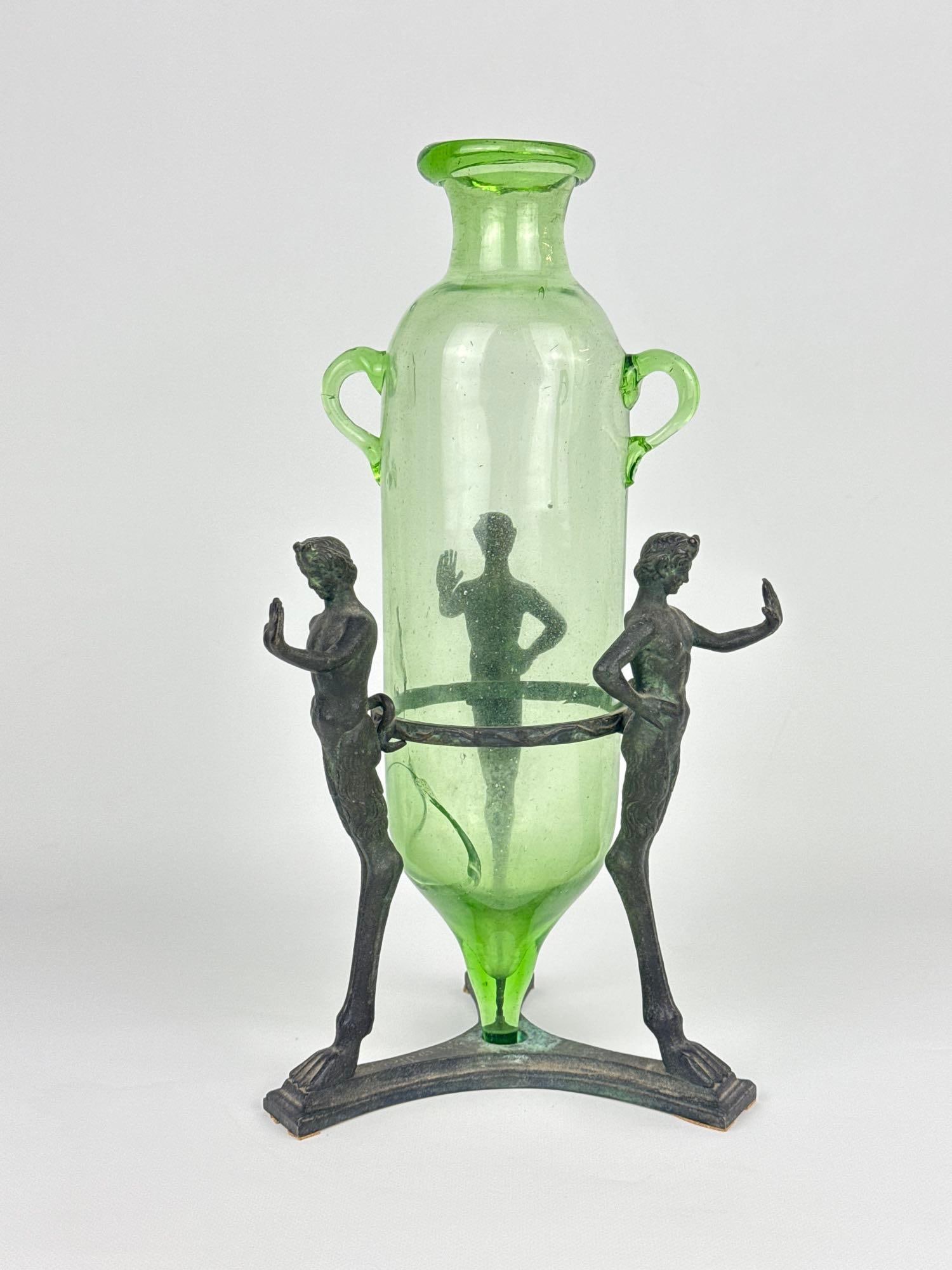 GIORGIO SOMMER NAPOLI ANTIQUE ITALIAN BRONZE GRAND TOUR THREE SATYRS STAND GREEN GLASS AMPHORA VASE: **Antique Italian Grand Tour patinated bronze tripod stand sculpted as three satyrs holding a light green blown glass amphora vase. NOTE: Loses / cracks to glass as shown in photos. Approximate Dimens