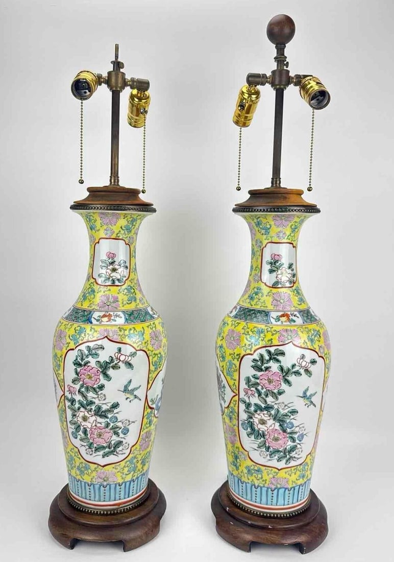 PAIR OF VINTAGE CHINESE YELLOW-GROUND FAMILLE ROSE PORCELAIN VASE TABLE LAMPS: Pair of Chinese yellow-ground famille rose porcelain vases mounted as table lamps Approximate Dimensions: taller 32" H x 7" Dia. at base Artist or Maker: Chinese; yellow-ground famille rose po