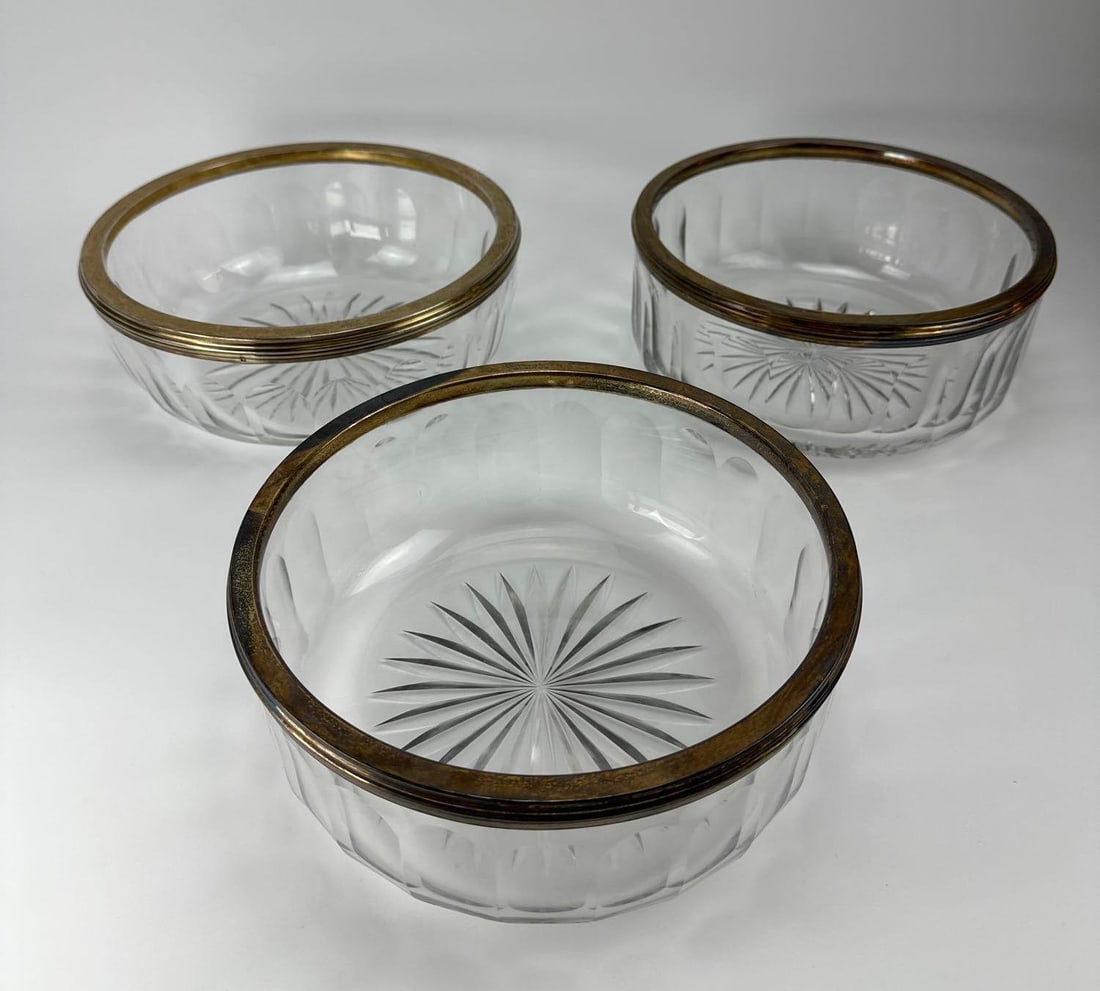 THREE ANTIQUE BACCARAT ATTR. HEAVY CUT CRYSTAL BOWLS WITH SILVER COLLARS, STAR CUT: Three antique French cut crystal bowls with applied silver collar rims, panel cut sides and star cut bases, in graduated sizes. Medusa marks to silver. Approximate Dimensions Largest Item: 4" H x 
