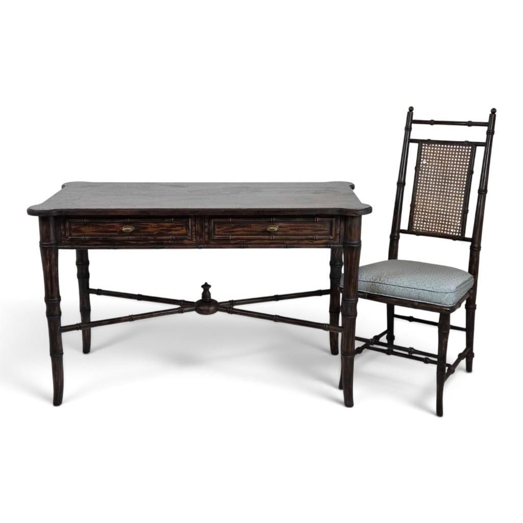 VINTAGE FAUX BAMBOO DESK AND CANED BACK CHAIR: A faux bamboo writing desk with two drawers and a matching caned-back side chair. Desk Approximate Dimensions: 29.75" H x 47.25" W x 23.25" D Chair Approximate Dimensions: 41.5" H x 17