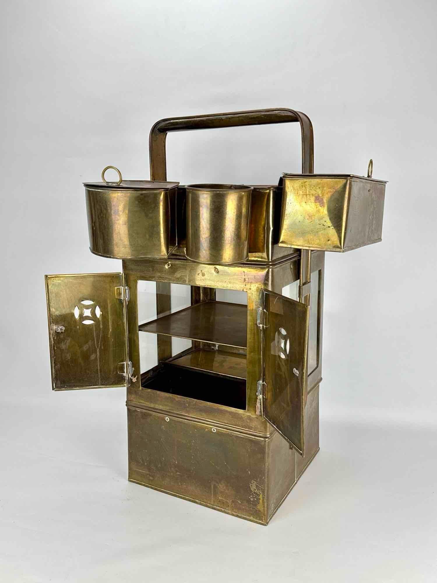VINTAGE CHINESE BRASS NOODLE STREET VENDOR HOT POT WARMER CART: *Antique Chinese brass street vendor noodle or dim sum cart designed with a double-doored glass display cabinet base, a large overhead carrying handle, and removable warming containers, condiment jars