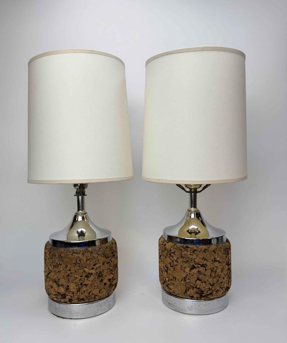 PAIR MID CENTURY CORK & CHROME TABLE LAMPS: pair of mid century cork and chrome cylindrical table lamps with drum shades Approximate Dimensions: 18.25” H X 5.75” W Shades 8.5” H X 7” Dia. Artist or Maker: Unknown Provena