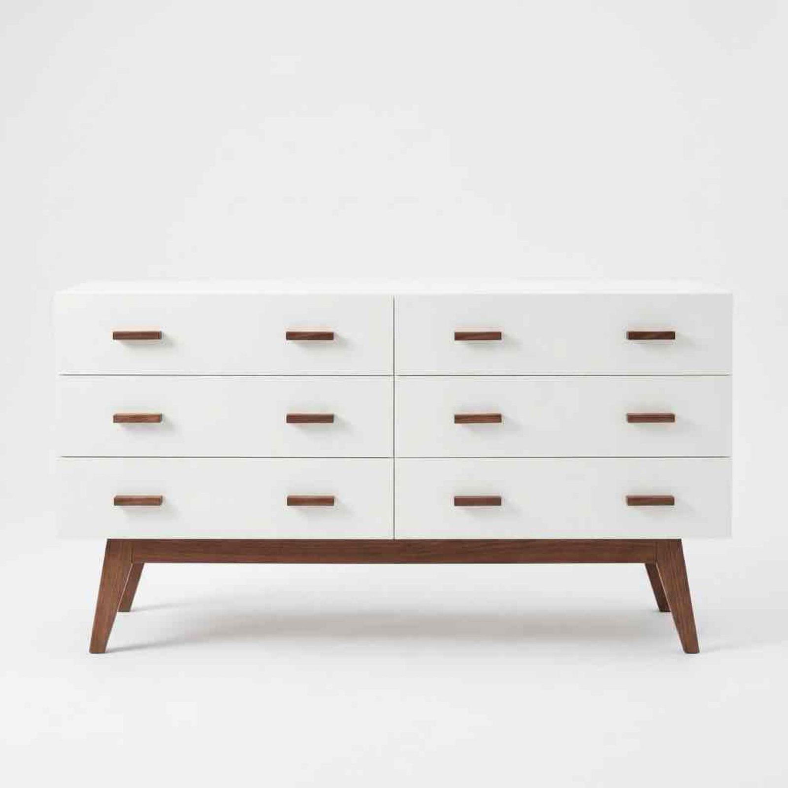 MID-CENTURY MODERN STYLE SIX-DRAWER DRESSER, WHITE LAMINATE: A contemporary, non-vintage six-drawer dresser or credenza, laminate finish. Approximate Dimensions: 16” x 55” x 32” H Artist or Maker: Unsigned; no maker’s label, stamp or serial 