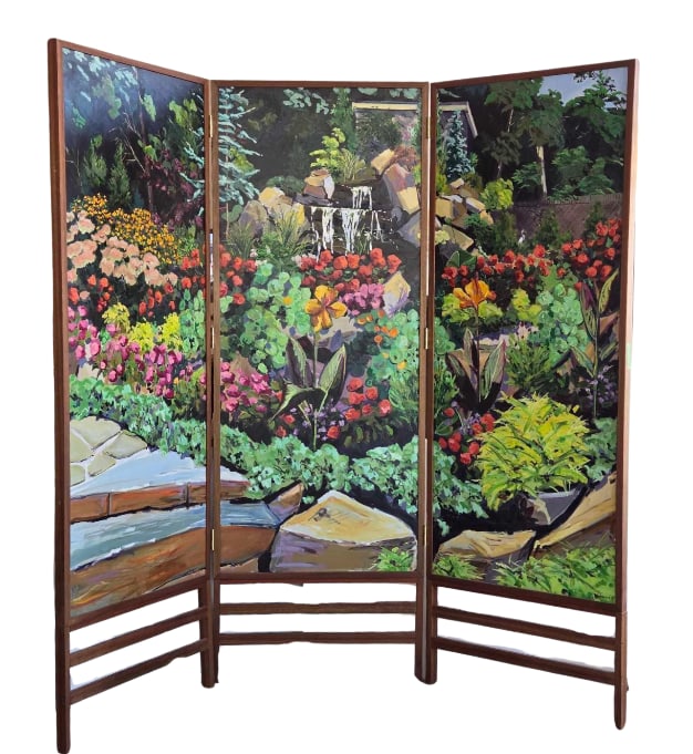 SIGNED WIELGUS PAINTED THREE PANEL GARDEN SCREEN ROOM DIVIDER | TRIPTYCH PAINTING: A large, hand painted three panel folding screen/room divider, forming a continuous garden landscape with a tiered stone fountain and flower beds, in hardwood frames over horizontal slatted lower regi