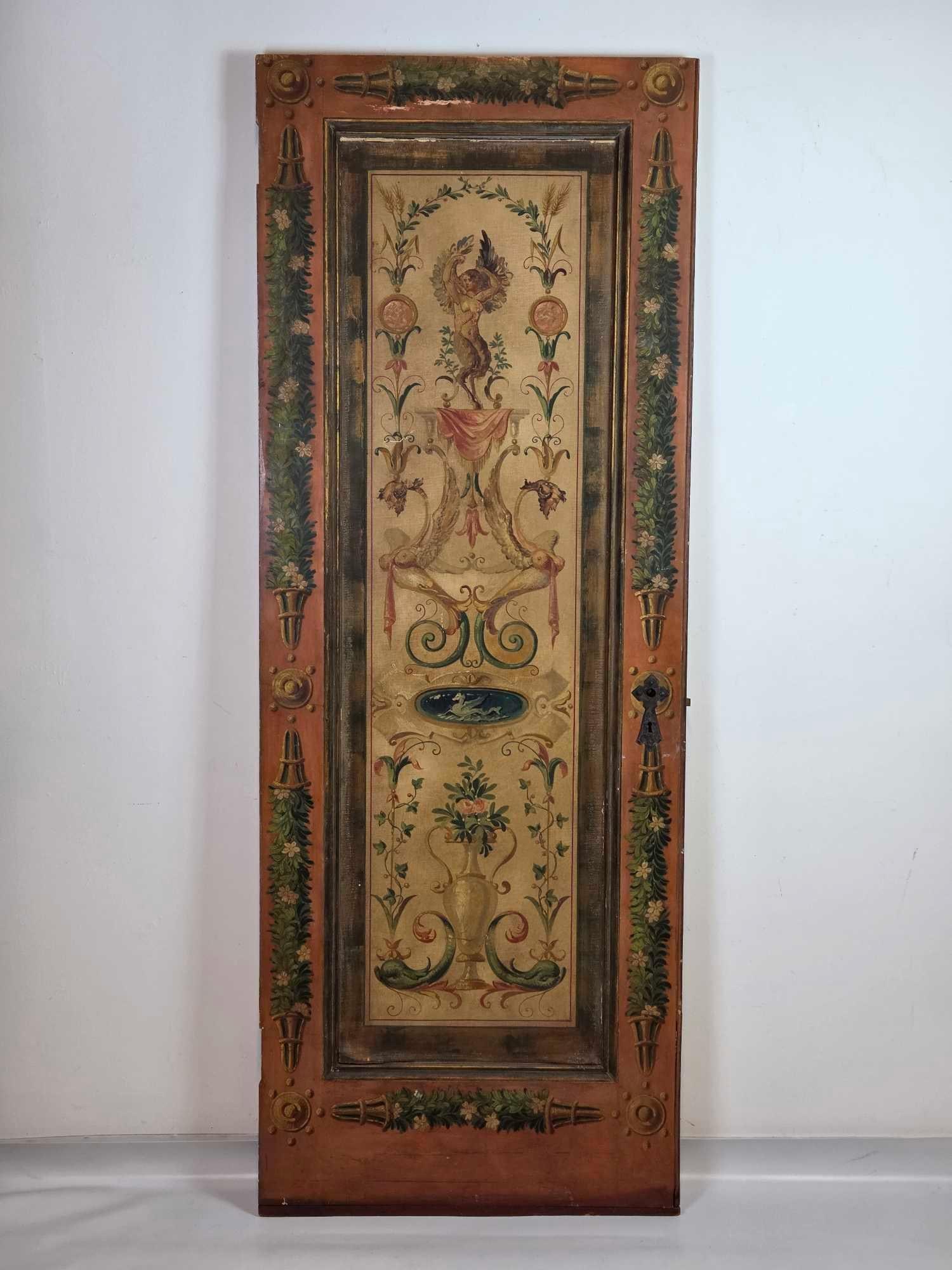 NEOCLASSICAL POLYCHROME PAINTED DOOR, POMPEIAN GROTESQUE FRONT AND GRISAILLE REVERSE: a neoclassical polychrome painted single-panel door, decorated on BOTH faces. Approximate Dimensions: 81” H x 30” W x 1.75” D Artist or Maker: Unsigned Provenance: From a New York Co