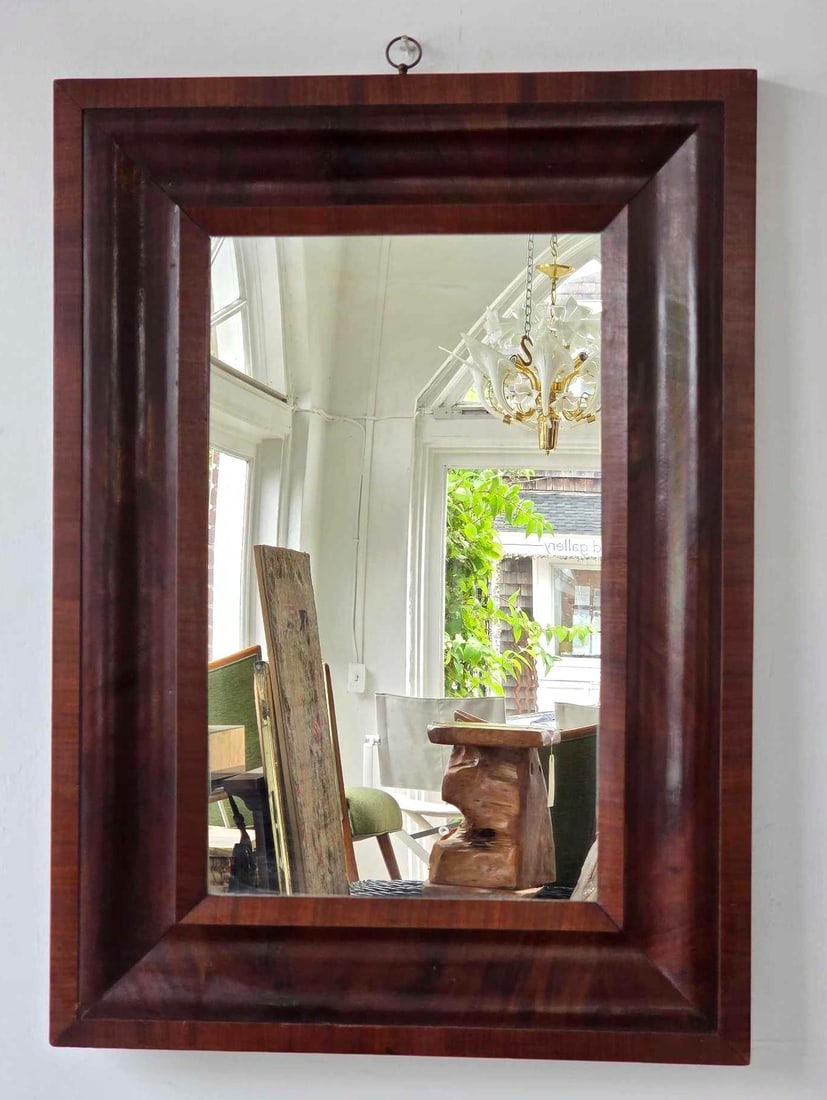 ANTIQUE OGEE MIRROR: An antique wall mirror in a deep ogee moulded frame Approximate Dimensions: 28.5" H x 20.5" W Artist or Maker: Unknown Provenance: From a New York Collector Notes: Although care is taken to