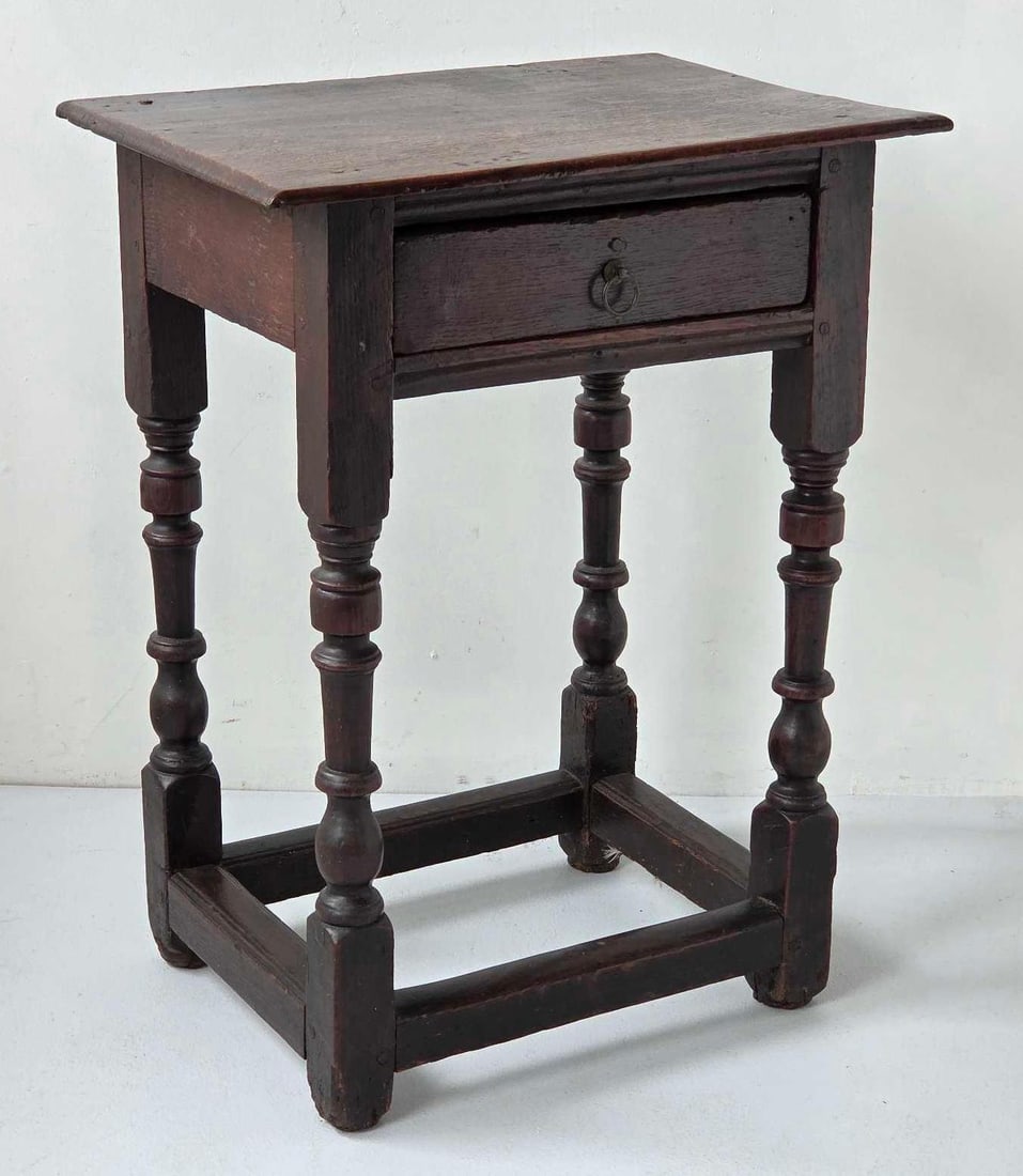 ANTIQUE ENGLISH OAK ONE DRAWER TABLE: An antique English oak side table of joint stool proportion, the plank top over a single drawer Approximate Dimensions: 27" H x 20.75" W x 14.5" D Artist or Maker: Unknown Provenance: From