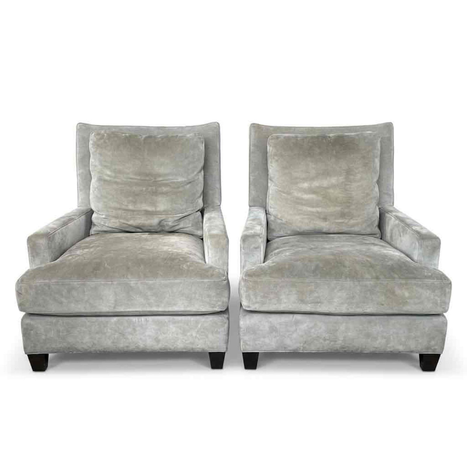 PAIR OF BAKER FURNITURE LOUNGE CHAIRS IN GREY SUEDE: a pair of Baker Furniture lounge chairs upholstered in a pale dove-grey suede Approximate Dimensions: 33” W x 38” D x 39” H Artist or Maker: Baker Furniture Provenance: From a New Yo
