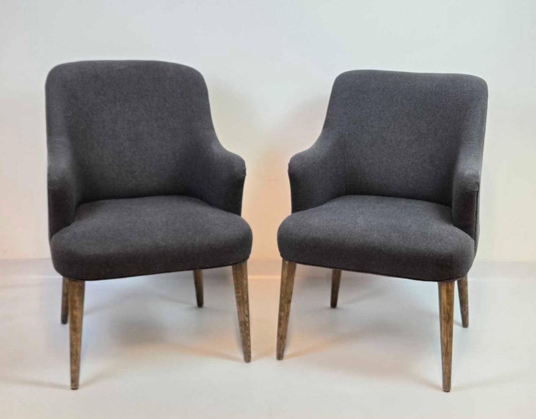 PAIR OF FOUR HANDS BRUBECK DINING ARMCHAIRS, CHARCOAL WOOL WITH CERUSED OAK LEGS: a pair of Four Hands Brubeck dining armchairs Approximate Dimensions: 35.5” H x 24” W x 26” D Artist or Maker: Four Hands Provenance: From a New York Collector Notes: Although care i
