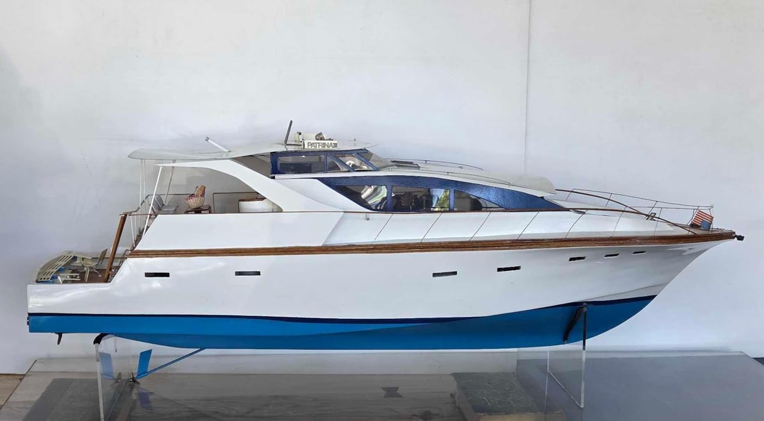 LARGE HAND CRAFTED WOOD AND ACRYLIC SCALE MODEL OF A YACHT: A large hand crafted scale model of the motor yacht Patrina III, built in wood and acrylic with a white and blue hull, glazed wheelhouse and detailed deck fittings Approximate Dimensions: 12" H x 