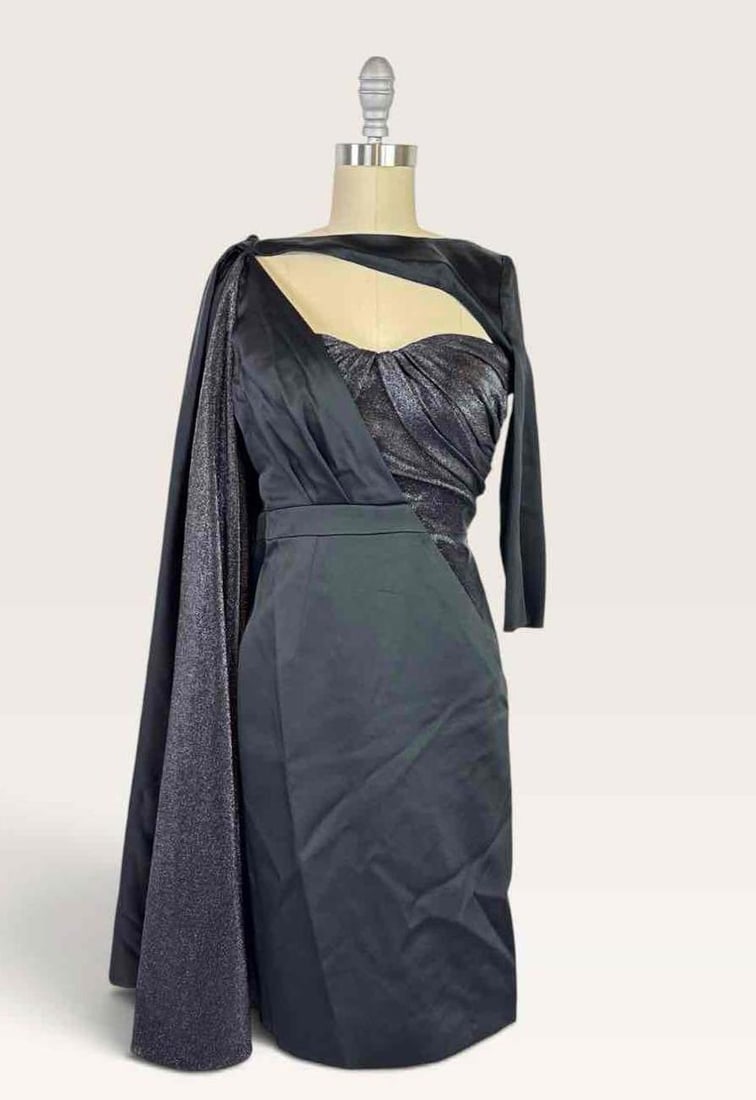 MOSCHINO COUTURE! GREY SATIN AND LUREX ONE SHOULDER CUTOUT DRESS, SIZE IT 40 | ARCHIVAL SAMPLE: Charcoal grey satin one-shoulder dress with a bust cutout, a single draped long sleeve, ruched detailing, abd caped shoulder. Made in Italy. Retail (per tag): $4,170 Size: I 40 Artist