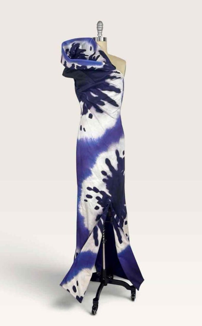 MOSCHINO COUTURE! TIE DYE ASYMMETRIC GOWN IN PURPLE AND WHITE IT42 (1 of 2) | ARCHIVAL SAMPLE: Full length one shoulder asymmetric maxi gown in purple and white tie dye burst printed cotton, with draped shoulder, twisted bodice, and gathered asymmetric hem. Made in Italy. Retail (per tag): $5,4
