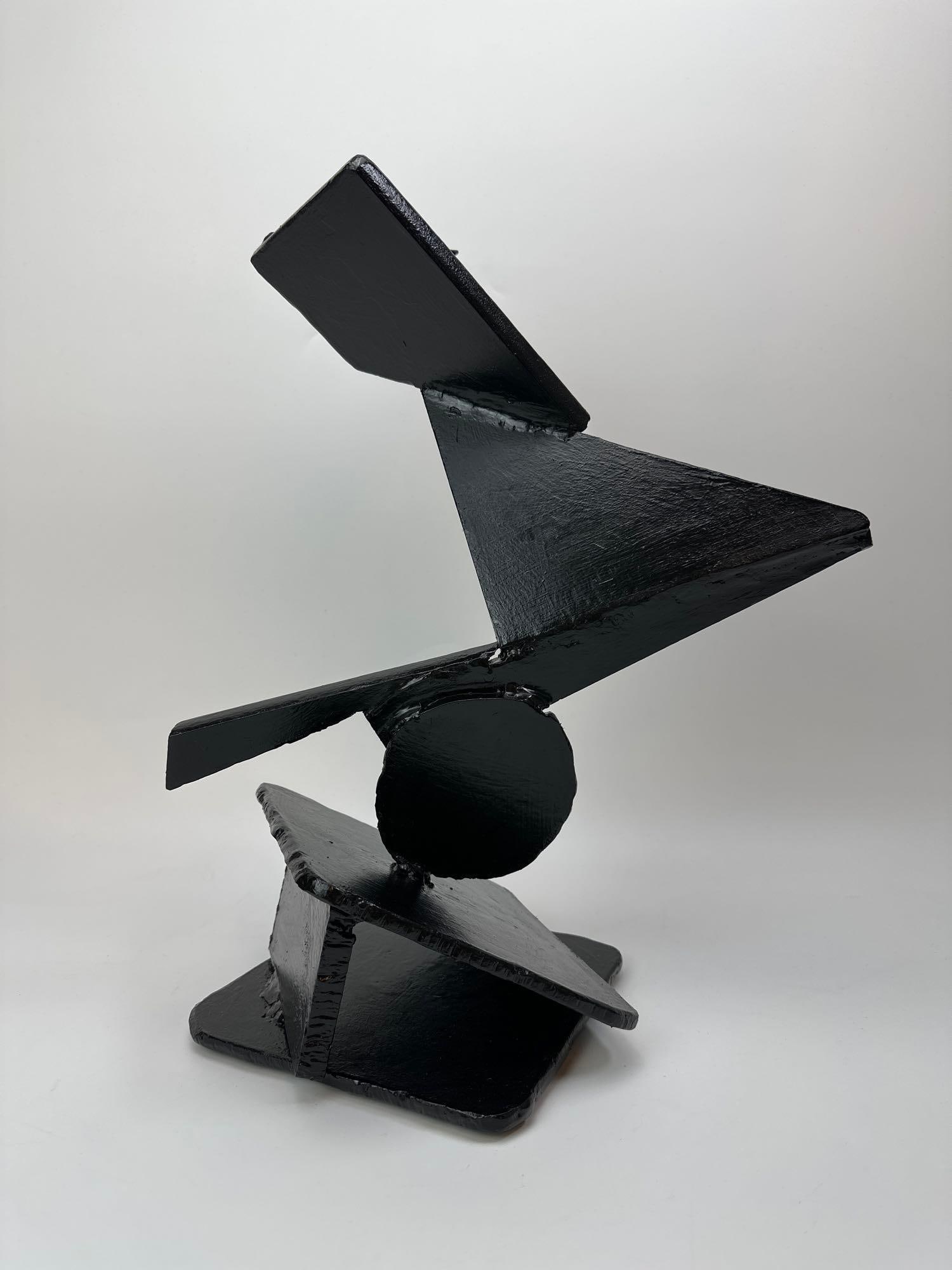JAMES T. GRECO ABSTRACT WELDED AND PAINTED STEEL SCULPTURE: Abstract welded steel sculpture, black painted geometric planes. Approximate Dimensions: 14" x 10" x 18" H Artist or Maker: James T. Greco Provenance: From a New York Collector Notes: Although care is