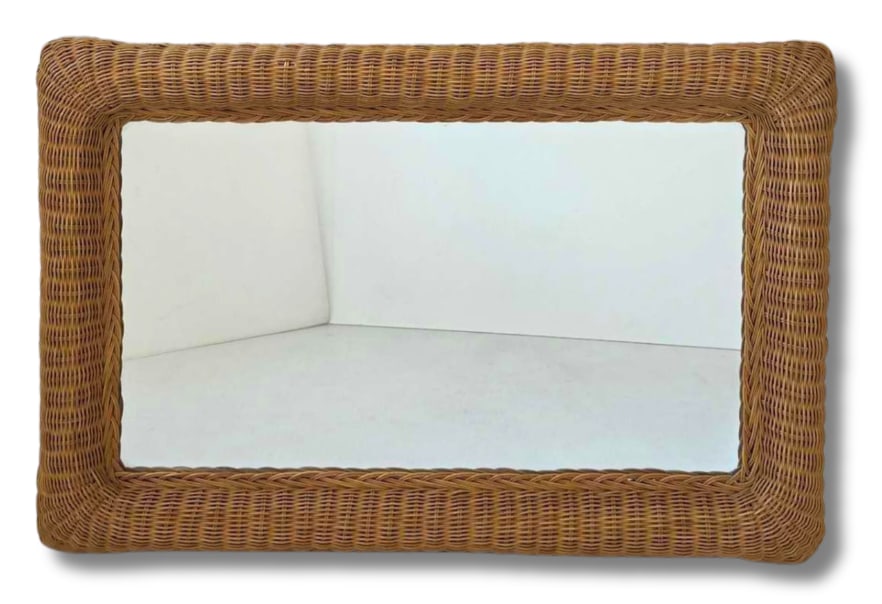 VINTAGE WOVEN RATTAN FRAMED RECTANGULAR MIRROR: Rectangular mirror in a deep woven rattan frame, rolled outer edge, plain glass plate, and paper backed wood frame Approximate Dimensions: 24.25" x 36" Artist or Maker: Unknown Provenance: A N