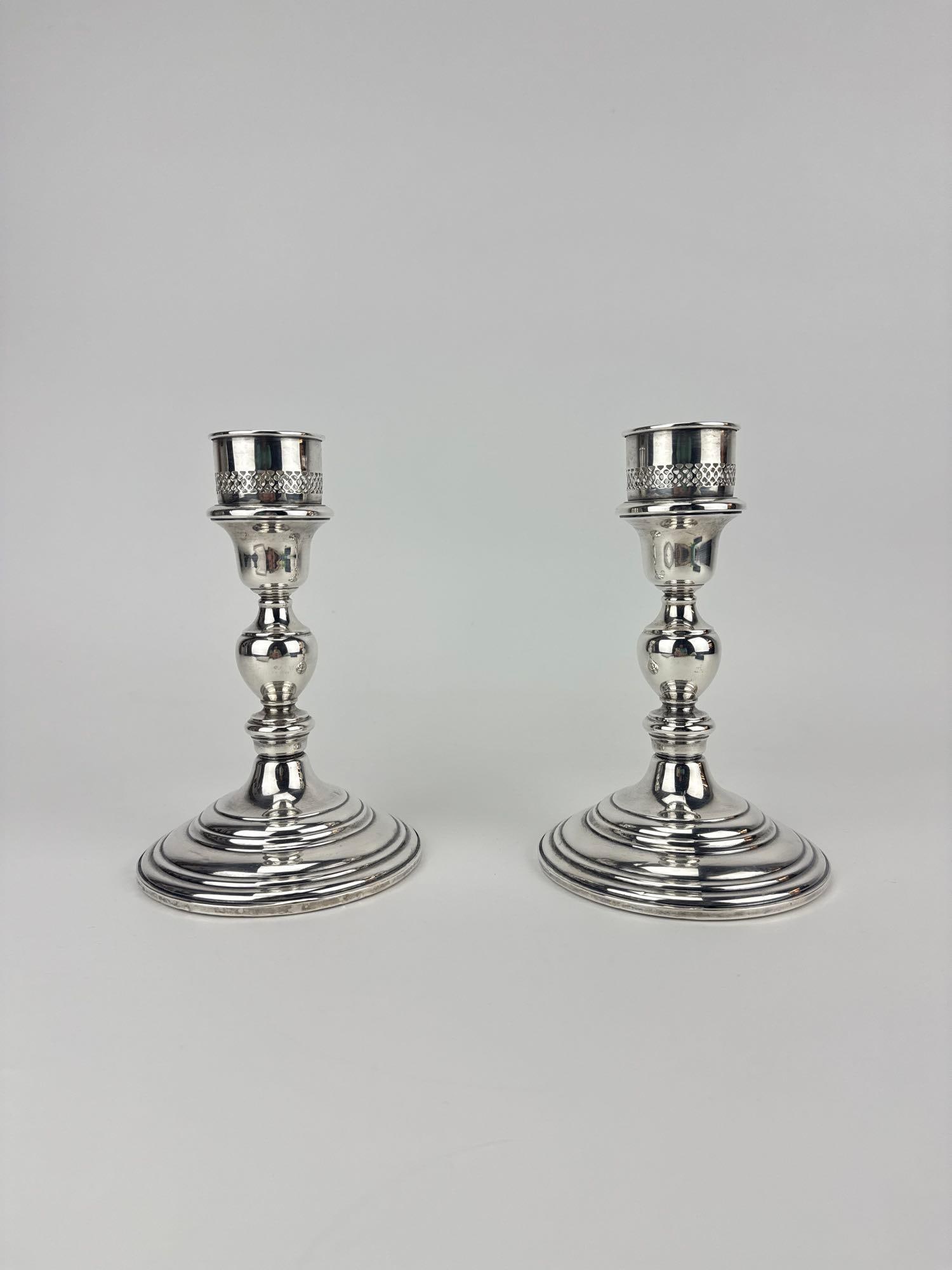 PAIR OF CARTIER STERLING WEIGHTED CANDLESTICKS (1 of 13)