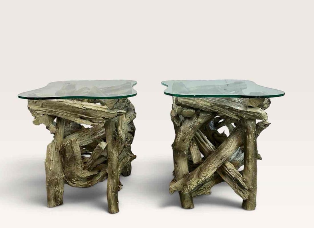 PAIR OF ORGANIC MODERN DRIFTWOOD BASE SIDE TABLES WITH FREE FORM GLASS TOPS: Pair of side tables, each with a base built up from weathered driftwood branches in a bleached silver grey tone, supporting a free form glass top with a polished edge Approximate Dimensions Each: 21.5
