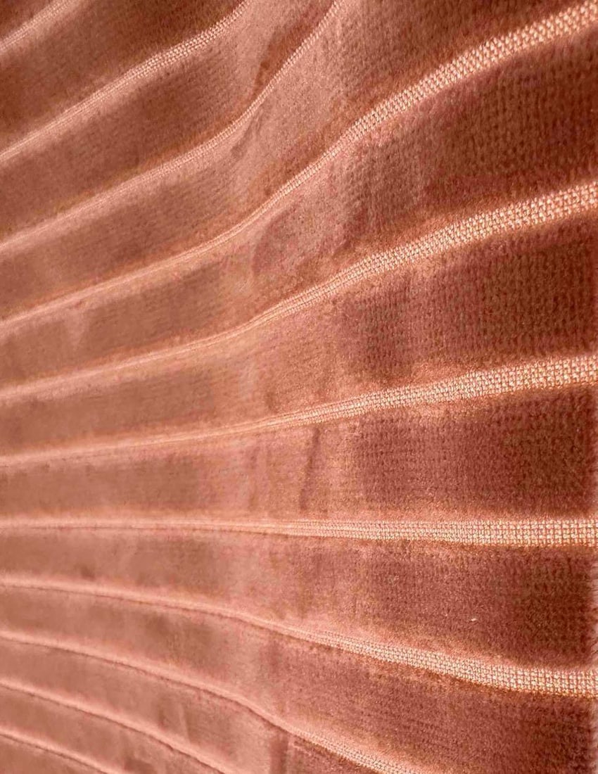 LEE JOFA FULL BOLT OF CORAL STRIPED CORDUROY VELVET UPHOLSTERY FABRIC, 26 YARDS: Full bolt of striped cut velvet corduroy upholstery cloth in coral, on the original roll with the mill inspection tag attached Approximate Dimensions: 26 yards, 57 "W overall, 54 "W usable Art