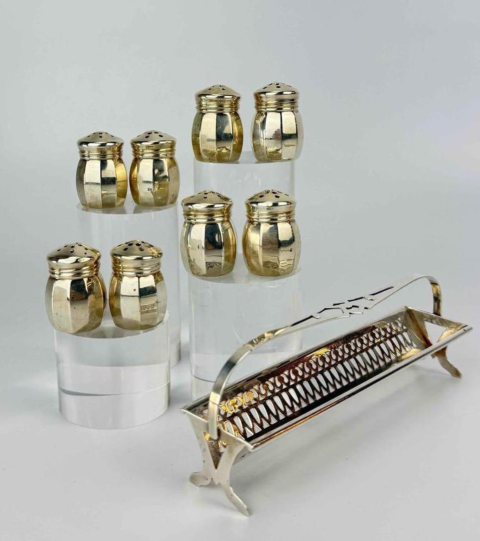 STERLING LOT: 4 MINIATURE SALT & PEPPER SETS, CRACKER TRAY: Group of sterling silver miniatures comprising four pairs of miniature salt and pepper shakers together with a cracker tray. Approximate Dimensions: Tallest: 2” H X 5.75” W X 1.75” D