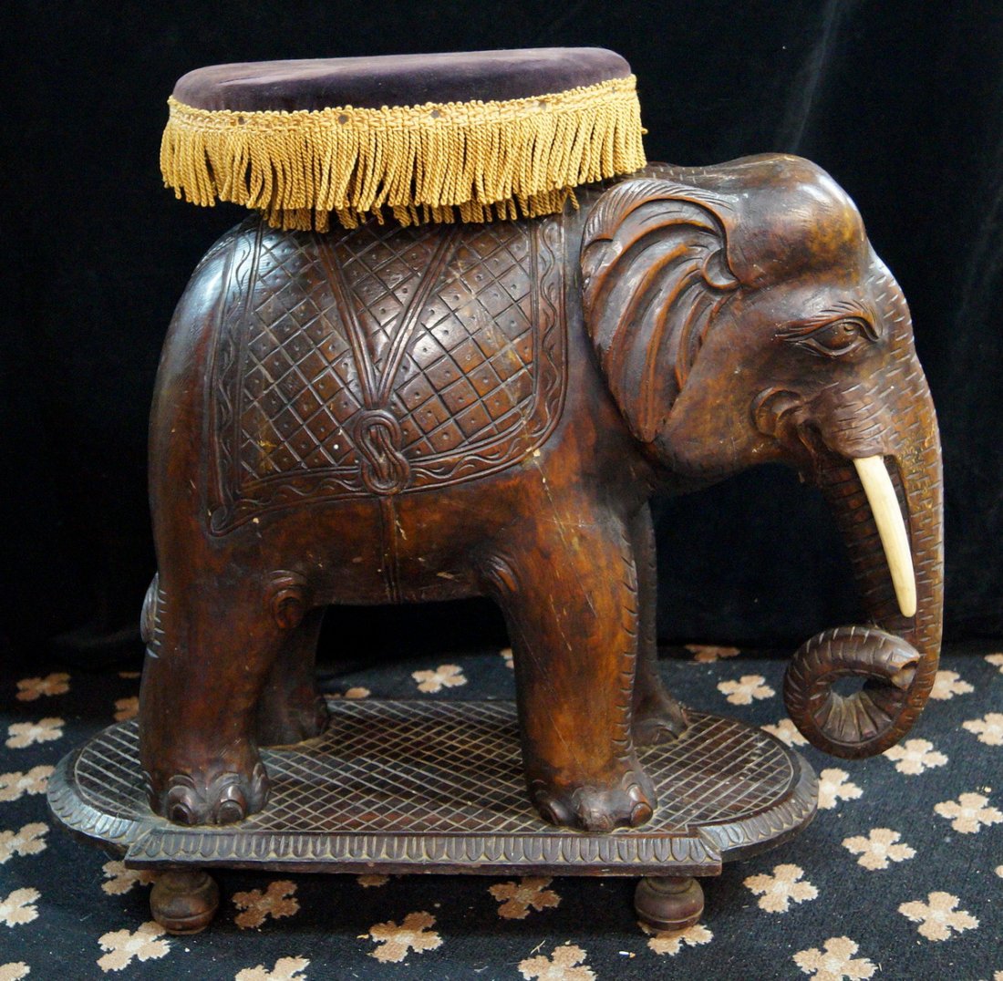 CARVED WOOD ELEPHANT STOOL: CARVED WOOD ELEPHANT STOOL 23"H 24"L 12"D