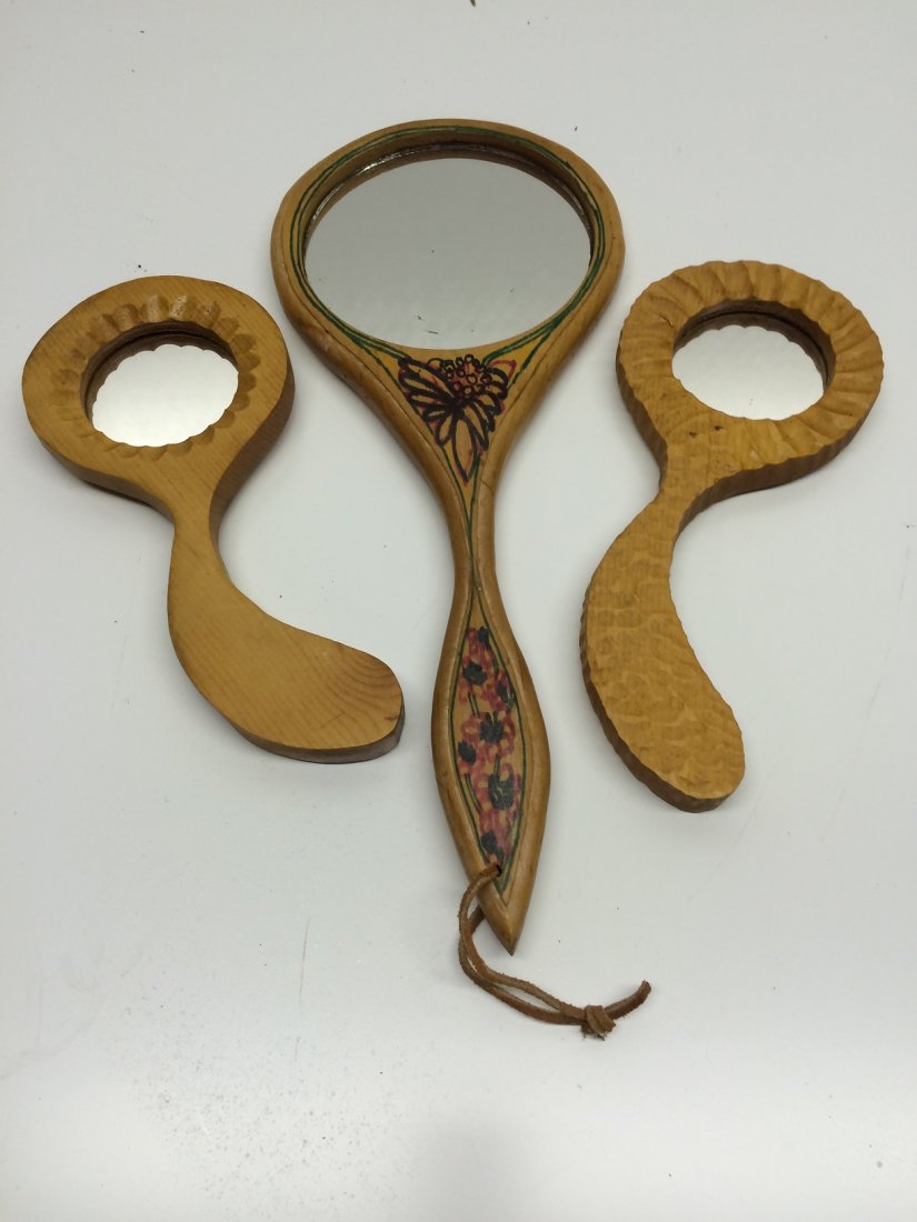 +COLLECTION LOUISE ODES NEADERLAND HAND CARVED MIRRORS: COLLECTION OF 3 HAND WOOD CARVED MIRRORS BY BROOKLYN ARTIST LOUISE ODES NEADERLAND THEY ARE SOLD AS A LOT OF 3 AND ARE IN GOOD CONDITION, WE OFFER IN HOUSE SHIPPING
